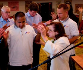 Verna Linzey Ministering During Altar Call Photo 2